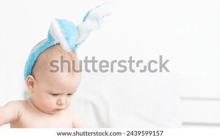 Cute little boy with bunny ears, Easter