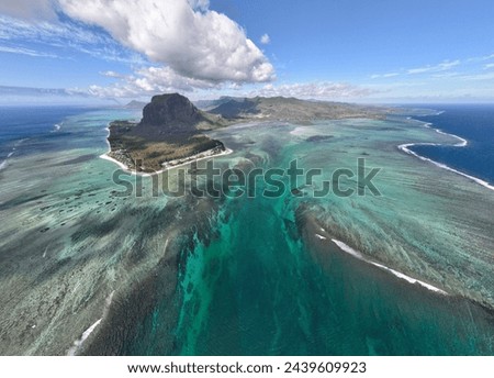 The underwater “waterfall” illusion picture in the southwest of Mauritius Island taken with a drone