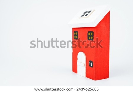 Wooden house on white background, small house, toy house.