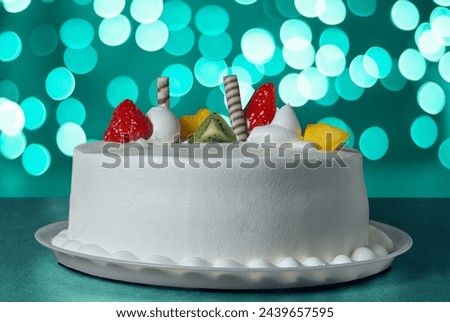 Sweet and delicious cake with a mint green background