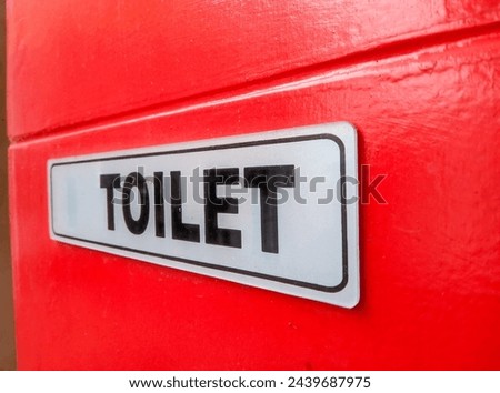 The writing shows the location of the public toilets 