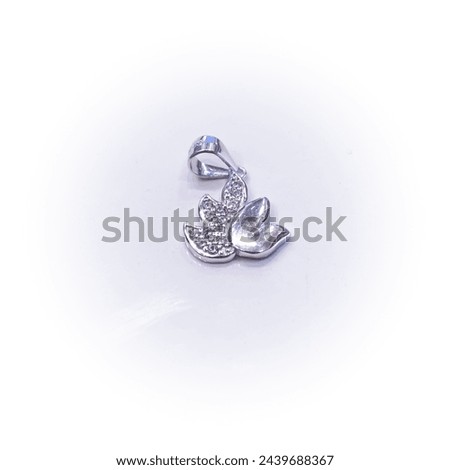 Picture of a pendant with white background. Silver, golden, platinum, fashion, chain, jewelry, girl, women, indian, asian, price, fall, stock, market, symbol, love, gift, engagement.