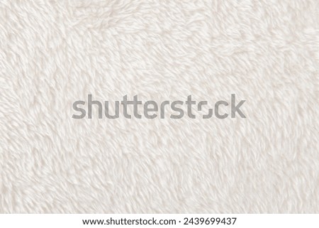 white plush fabric texture background, background pattern of soft warm material Royalty-Free Stock Photo #2439699437