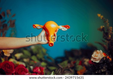 
Woman Holding a Uterus Model on a Floral Background. Medical worker specialized in gynecology and feminine fertility 
 Royalty-Free Stock Photo #2439715631