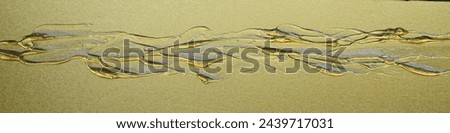Golden transparent fluid, acrylic paint, background is golden Japanese paper