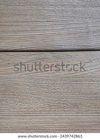 The beauty of natural teak wood grain. Erosion of teak wood grain with gray color.

