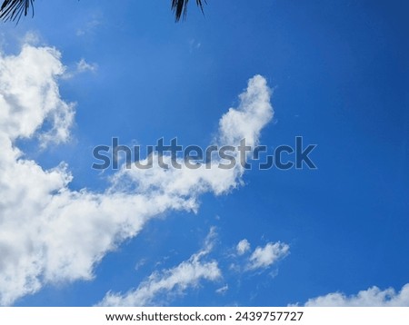 The sky is blue with a few clouds scattered throughout