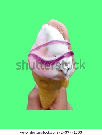 an ice cream cone held by a small child 