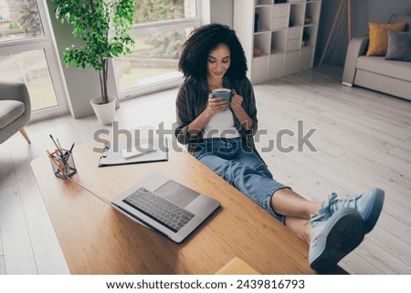 Photo of relaxing cute lady investor dressed shirt enjoying coffee aroma indoors workshop workplace workstation