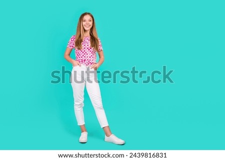Full body photo of nice teen woman posing model black friday dressed stylish pink print outfit isolated on aquamarine color background