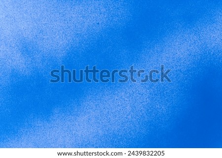 Blue background painted with spray paint