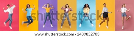 Group of cheerful multiethnic females jumping up together over colorful backgrounds, diverse happy women laughing and having great time, posing against bright studio backdrops, collage, panorama Royalty-Free Stock Photo #2439852703