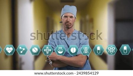 Multiple medical icons against portrait of caucasian male surgeon standing with arms crossed. medical science and technology concept