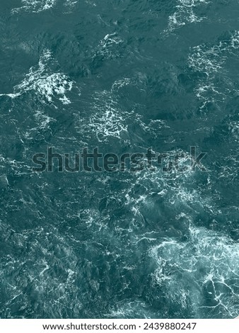 A picture of the sea while the wind blows and the ship sails towards shore