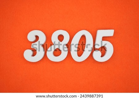 Orange felt is the background. The numbers 3805 are made from white painted wood.