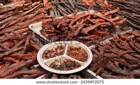 Closeup shot of the delicious Chinese food. Various dried meat on a local Chinese market. Taken with a medium format camera.