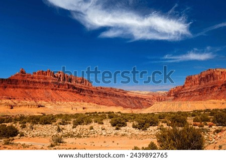 View of Monument Valley in Navajo Nation Reservation between Utah and Arizona. Royalty-Free Stock Photo #2439892765