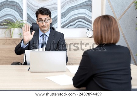 Stringent interviewer refusing to hire young inexperienced girl in the office	 Royalty-Free Stock Photo #2439894439