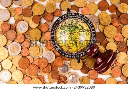 Picture of a Business Money Concept Idea Globe and Coins