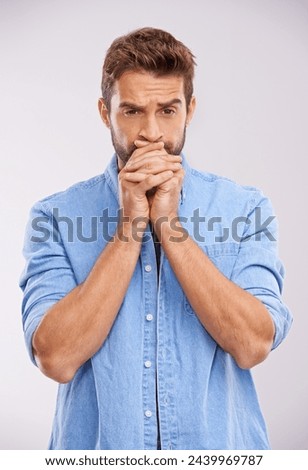 Anxiety, stress and nervous man in studio for results, outcome or suspense gesture on white background. Overwhelmed, worry and male model with panic expression, overthinking or waiting for answer Royalty-Free Stock Photo #2439969787