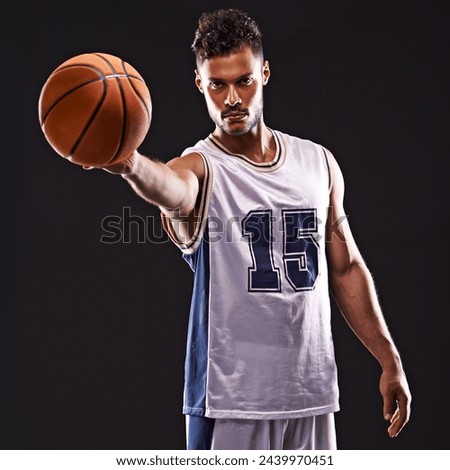 Man, portrait and basketball player in studio for sport, competition and training on black background. Professional athlete, career and exercise with ball for game, hobby and healthy model in fitness