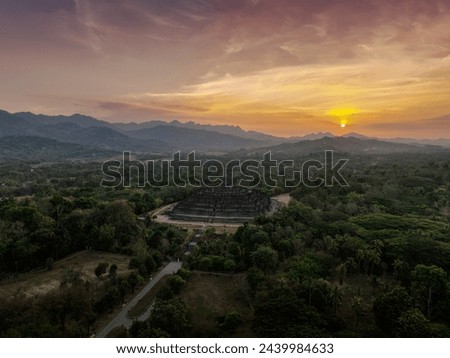 Aerial view of borobudur temple at sunset. The largest Buddhist temple in southeast asia relics of the old mataram kingdom. Photos for marketing needs on website or social media display. 