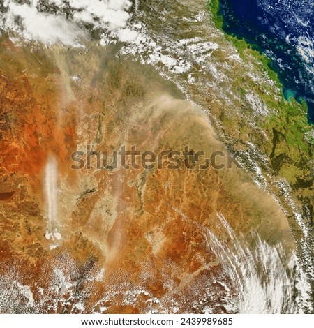 High Winds Raise Dust over Australia. . Elements of this image furnished by NASA.