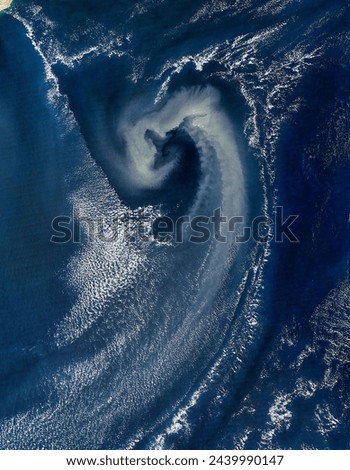 Dust storm over the Arabian Sea. Dust storm over the Arabian Sea. Elements of this image furnished by NASA. Royalty-Free Stock Photo #2439990147