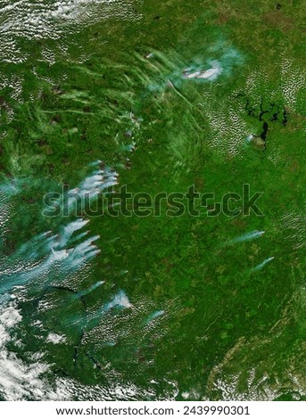 Fires in central Russia. Fires in central Russia. Elements of this image furnished by NASA. Royalty-Free Stock Photo #2439990301