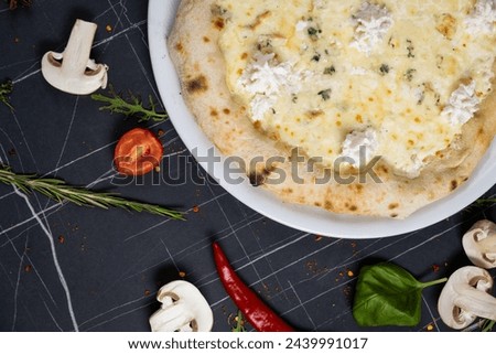 very tasty looking pizza with melted cheese