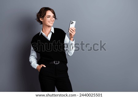 Photo of stunning nice lady dressed stylish clothes reading email letter post repost isolated on gray color background