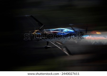 Stylized sport plane in flight. Digital work. Royalty-Free Stock Photo #2440027611
