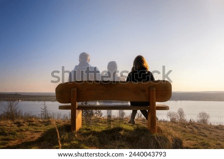 Symbolic image of a family on a bench on the subject of separation, death or custody disputes