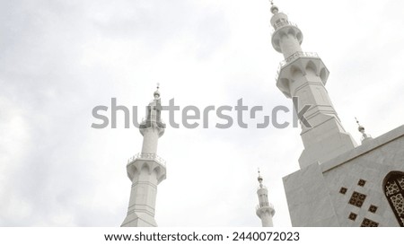 The White Towers of Syech Zayed Mosque. an Islamic mosque tower Royalty-Free Stock Photo #2440072023