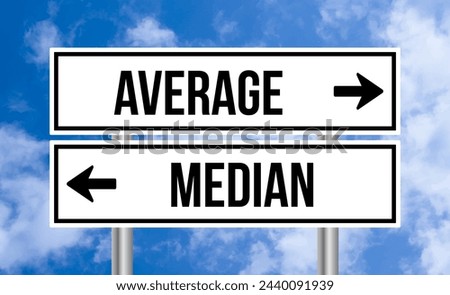 Median or average road sign on blue sky background Royalty-Free Stock Photo #2440091939