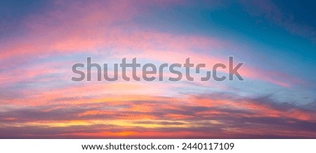 Gentle ligth colors of sunrise sundown sky with pastel  light  clouds, hi resolutions cloudscape panorama. Real sky Royalty-Free Stock Photo #2440117109