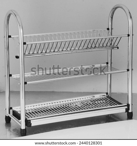 Plate rack stainless steel.bast quality  Royalty-Free Stock Photo #2440128301