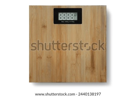 Digital weighing scale made of bamboo on white background.