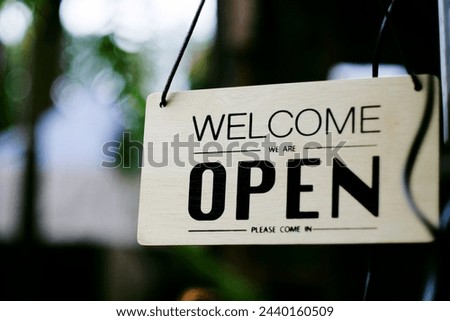 open welcome shop sign cafe entrance