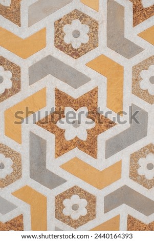 Beautiful marble inlay work. Pietra Dura inlay art technique used to build Taj Mahal, consists of Floral or Calligraphic inlays. Artwork of Taj Mahal is purely handmade by the highly skilled artisans. Royalty-Free Stock Photo #2440164393