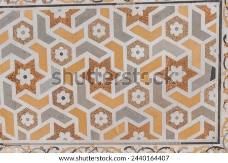 Beautiful marble inlay work. Pietra Dura inlay art technique used to build Taj Mahal, consists of Floral or Calligraphic inlays. Artwork of Taj Mahal is purely handmade by the highly skilled artisans. Royalty-Free Stock Photo #2440164407