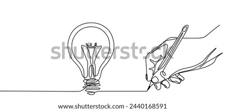 One line hand holding pencil and drawing single continuous line light bulb. 
