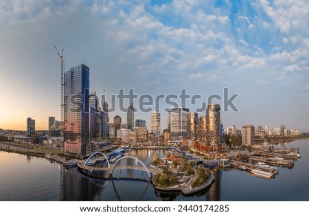 Panoramic sunset view of Elisabeth Quay in Perth from drone viewpoint. Royalty-Free Stock Photo #2440174285