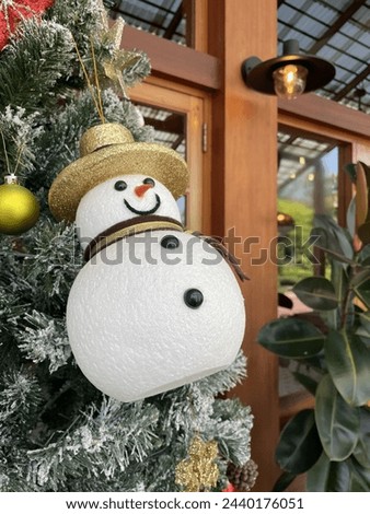 Snowman ornament on the Christmas tree