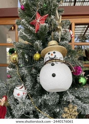 Snowman ornament on the Christmas tree
