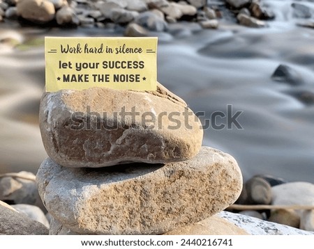 Inspirational Success Concept - work hard in silence let your success make the noise with nature background. Stock photo.