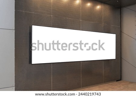 Modern Gallery Interior with Long and Wide Blank White Display Board - Mockup Background of a Wall-Mounted Screen for Corporate and Professional Presentations