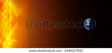 Solar winds and magnetic storm -    View of Earth from outer space with millions of stars around it and sun"Elements of this image furnished by NASA" Royalty-Free Stock Photo #2440227831