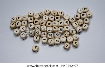 meditative, thoughtful wooden cubes with letters
