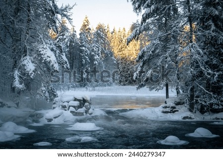 River landscape in winter in Kouvola, Finland Royalty-Free Stock Photo #2440279347